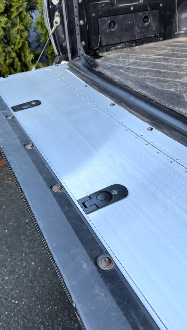 BPF 2005-2015 Toyota Tacoma Tailgate Panel installed on a truck showing a brushed metal finish with durable hinges and secure fasteners for OEM fitment and heavy-duty use.