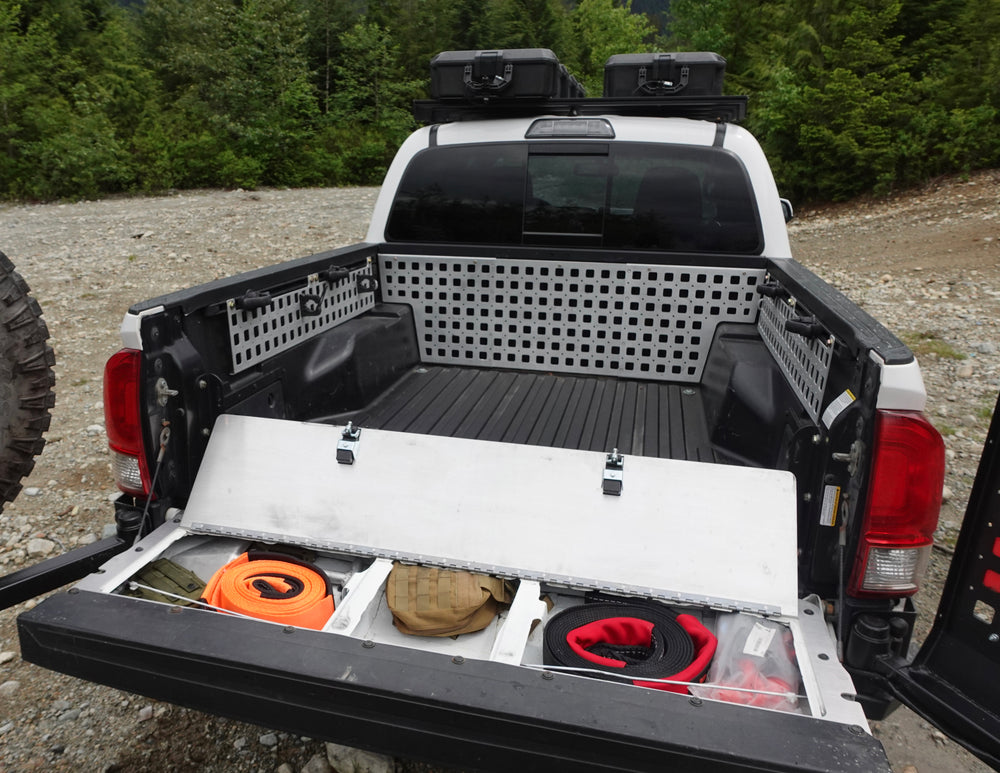 Tacoma truck bed with storage in the tailgate. Featuring BPFs tailgate storage panel for the 3rd gen Tacoma's.