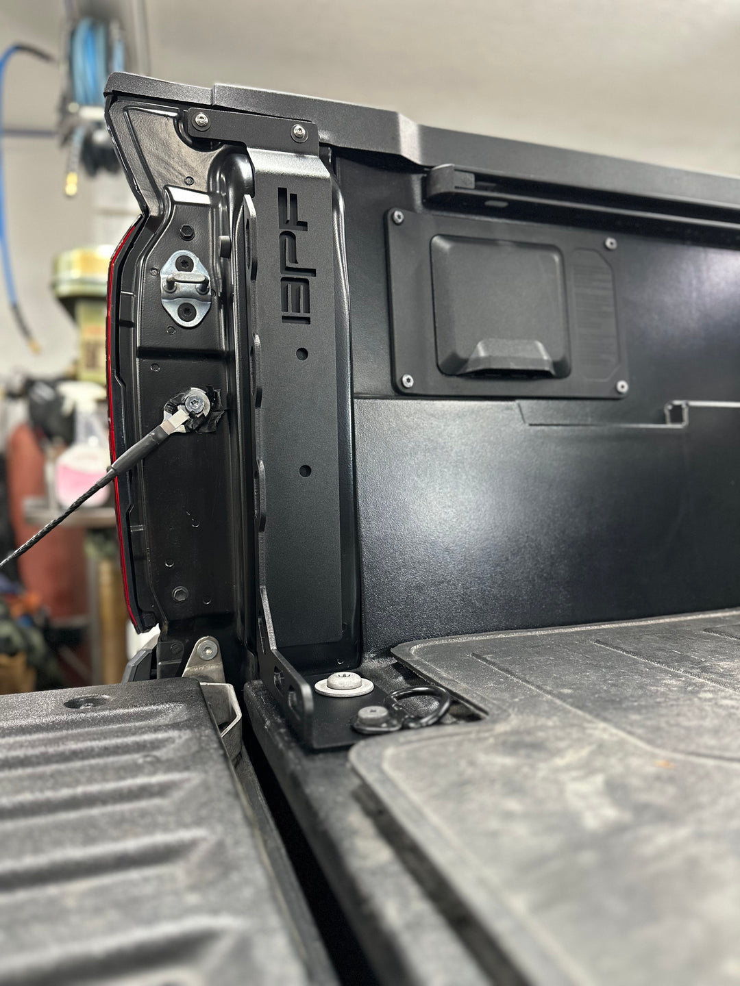Close-up of Black BPF 2024-2025 Toyota Tacoma Bed Stiffeners installed inside truck bed, showcasing durable CNC fabricated construction and precision OEM fitment.