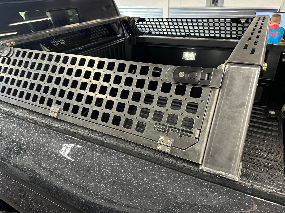 05-26 Tacoma Bed Rack fits 2nd,3rd and 4th gen Tacomas installed with durable black powder coated mesh panels and sturdy frame for heavy duty overlanding gear and cargo management.