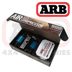 ARB Air Compressor, 12 Volt, Twin displayed in open packaging with dual compressors visible, designed for off-road and overlanding use with durable construction.