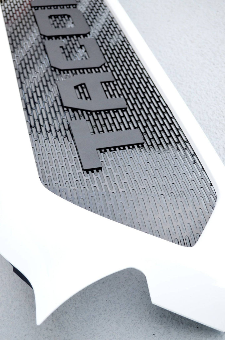 Close-up of a black mesh pattern with bold lettering on the BPF Completed 2012-2015 Toyota Tacoma Grill showing its textured, rugged design and durable finish.