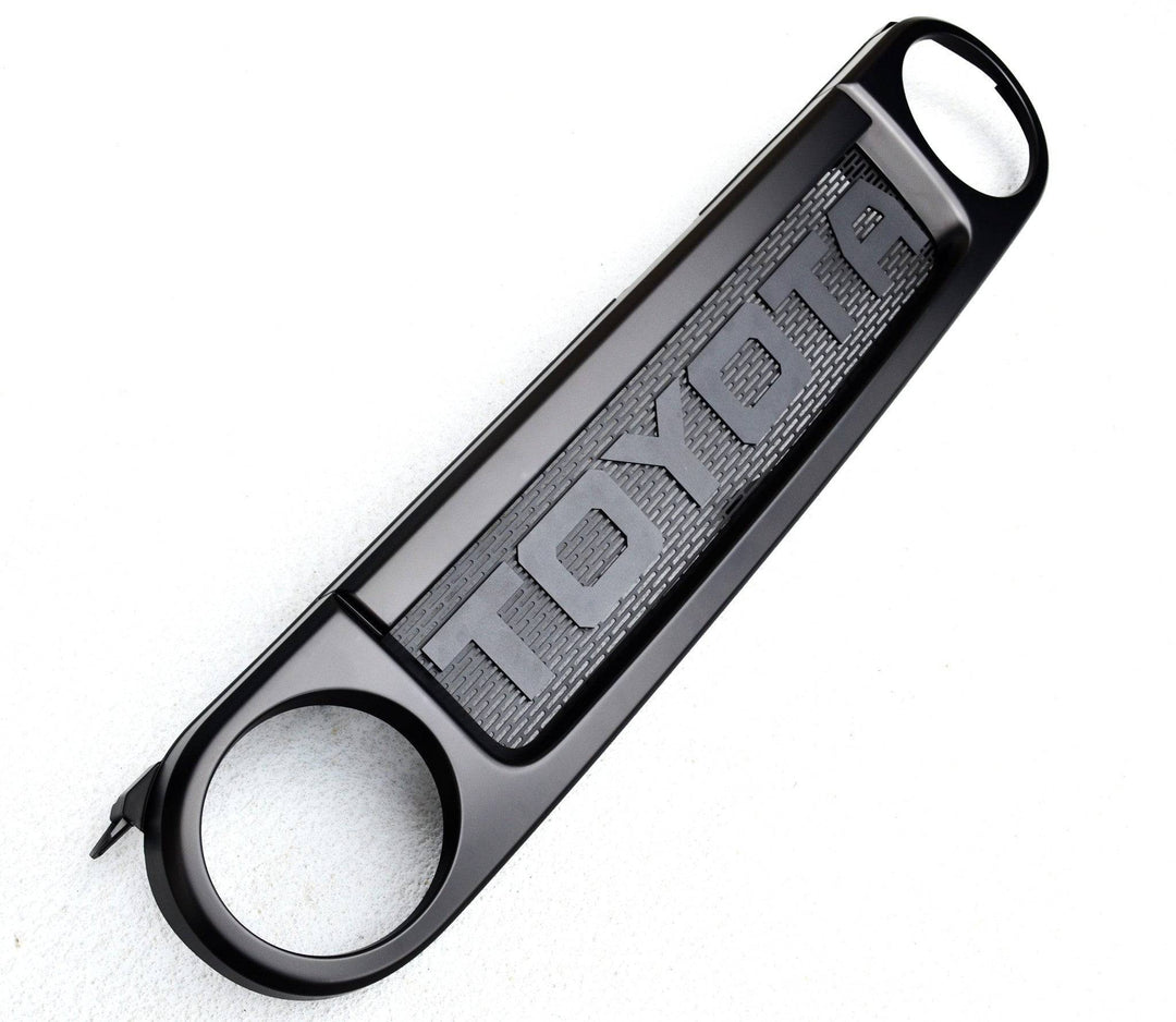 BPF Completed 2007-2014 FJ Cruiser Grill in black featuring bold TOYOTA lettering and mesh design, designed for durable, OEM fitment upgrade.