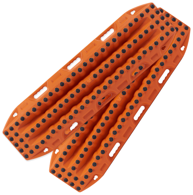 Pair of bright orange MAXTRAX MKII recovery traction boards with multiple traction cleats and handle slots designed for off-road vehicle recovery.