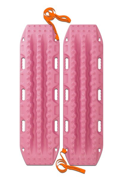 MAXTRAX MKII recovery boards in pink with built-in traction ribs and handles, designed for off-road vehicle tire traction and recovery in rugged terrain.